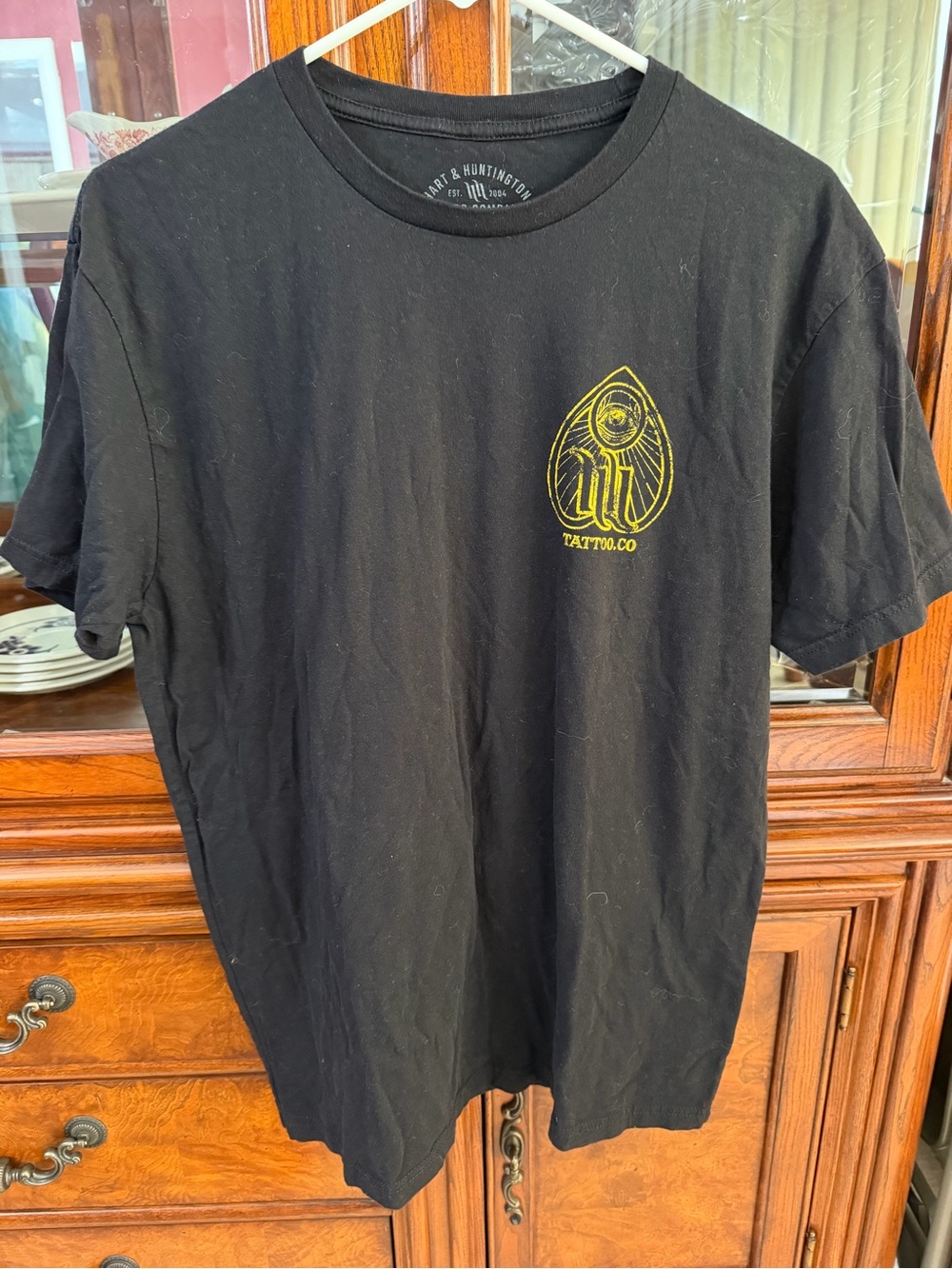 Men's Black Short Sleeve Tee with Yellow Chest Graphic